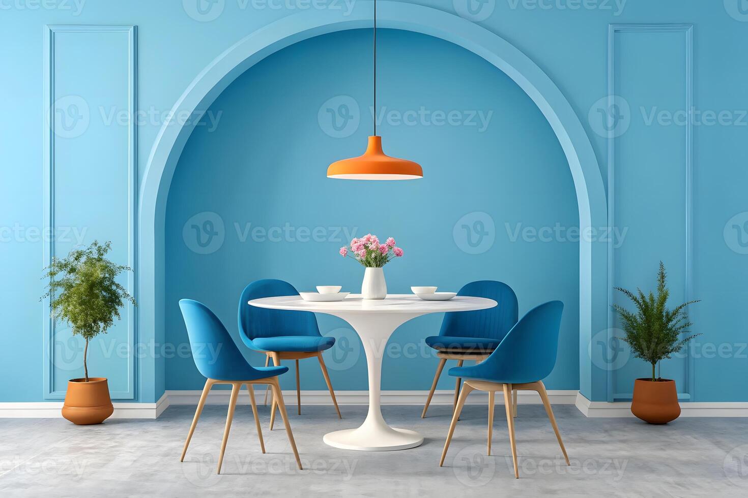 A blue dining room with a table and chairs photo