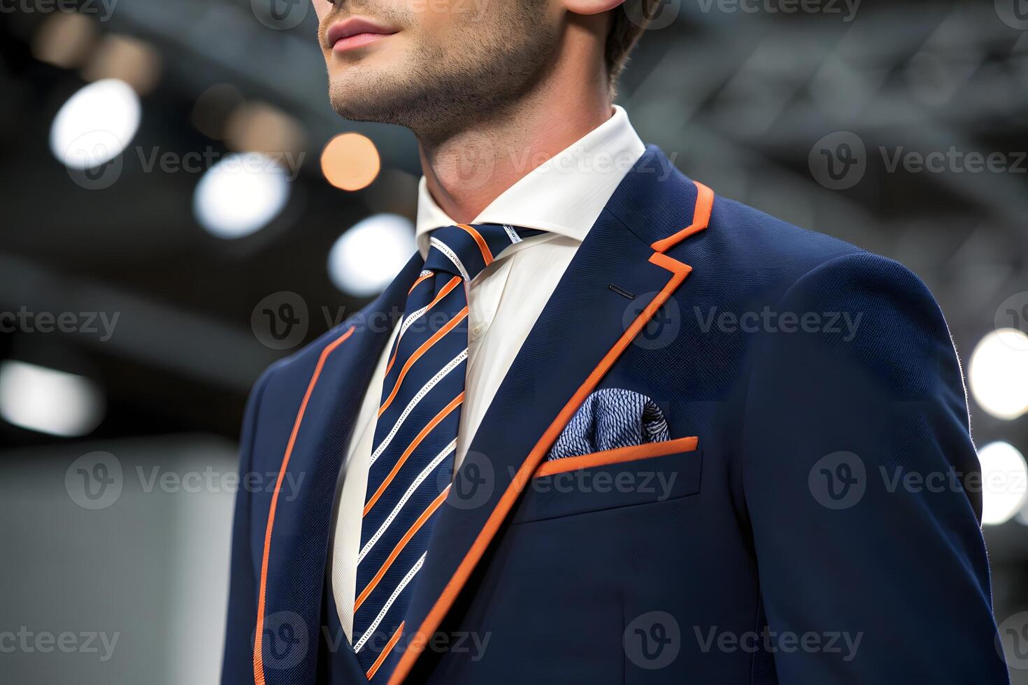 A man in a suit and tie looking up photo