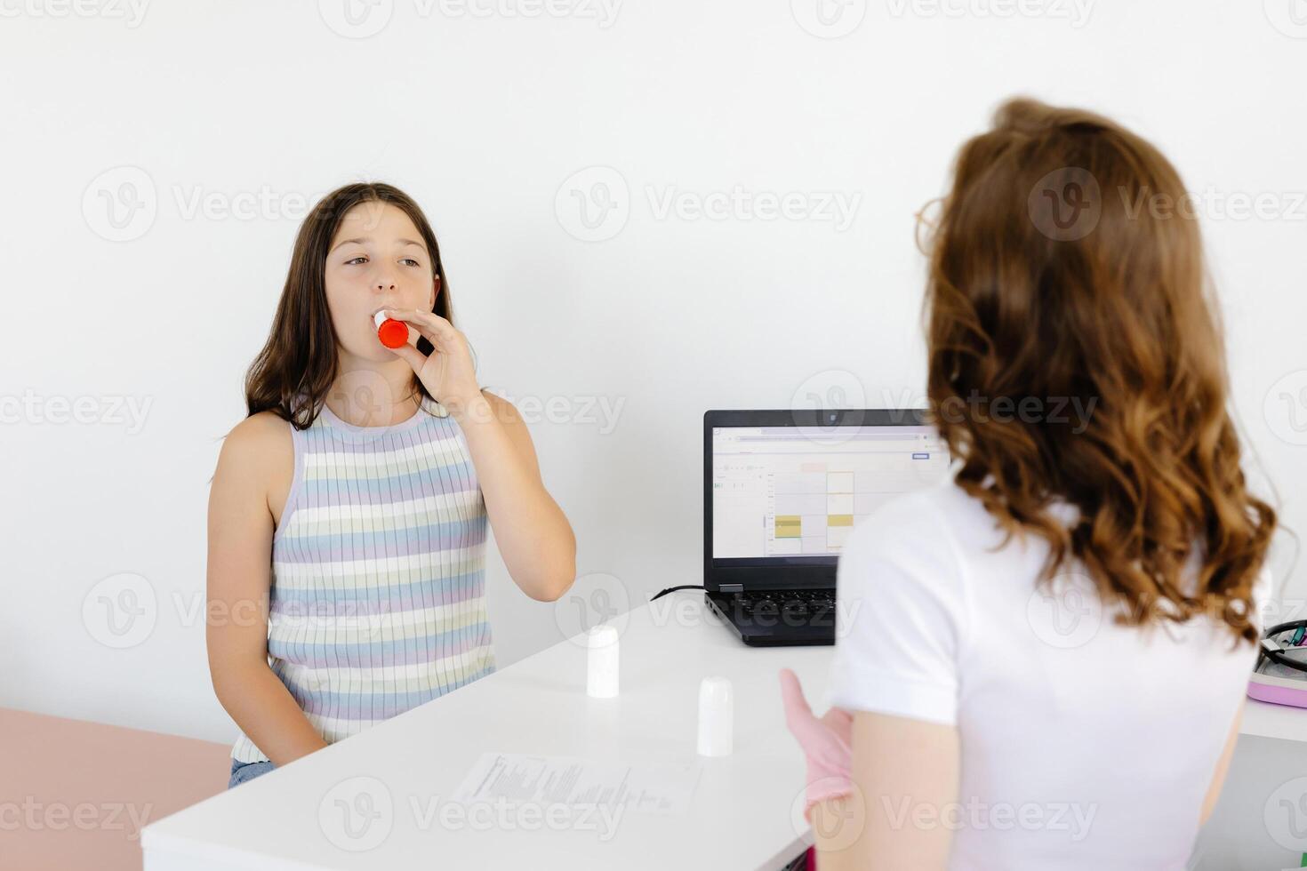 Teengirl having asthmatic attack and using inhaler preventing respiratory depression photo