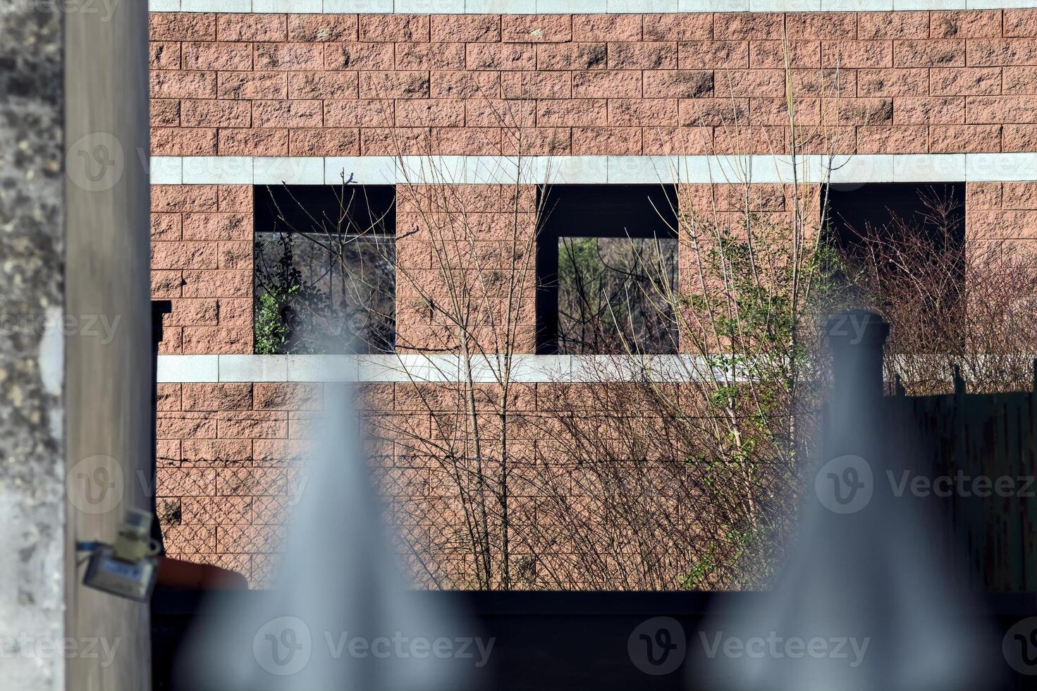 Part of the facade of an abandoned warehouse photo