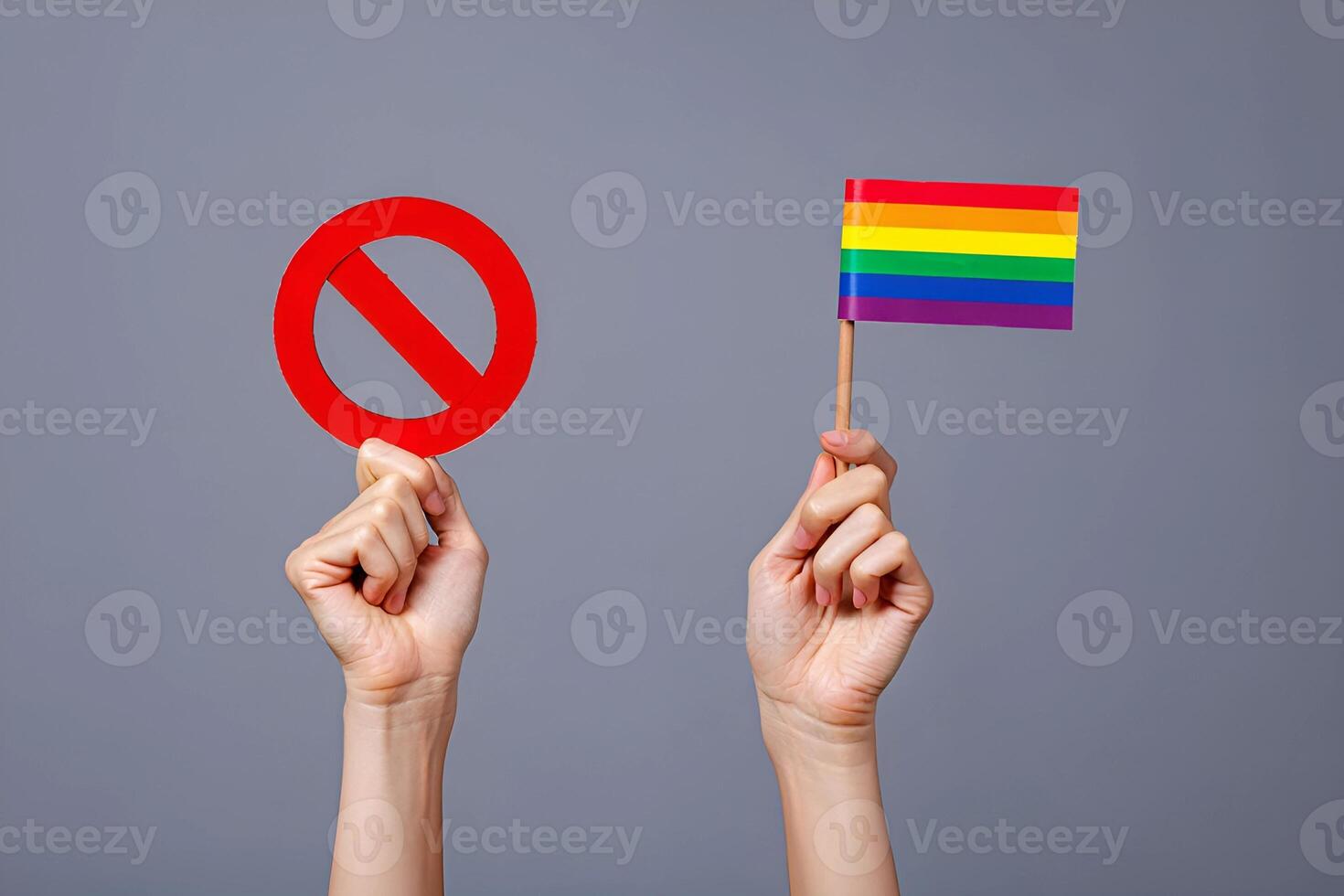 Rejecting Prejudice Holding a Rainbow Flag and a Prohibition Sign photo