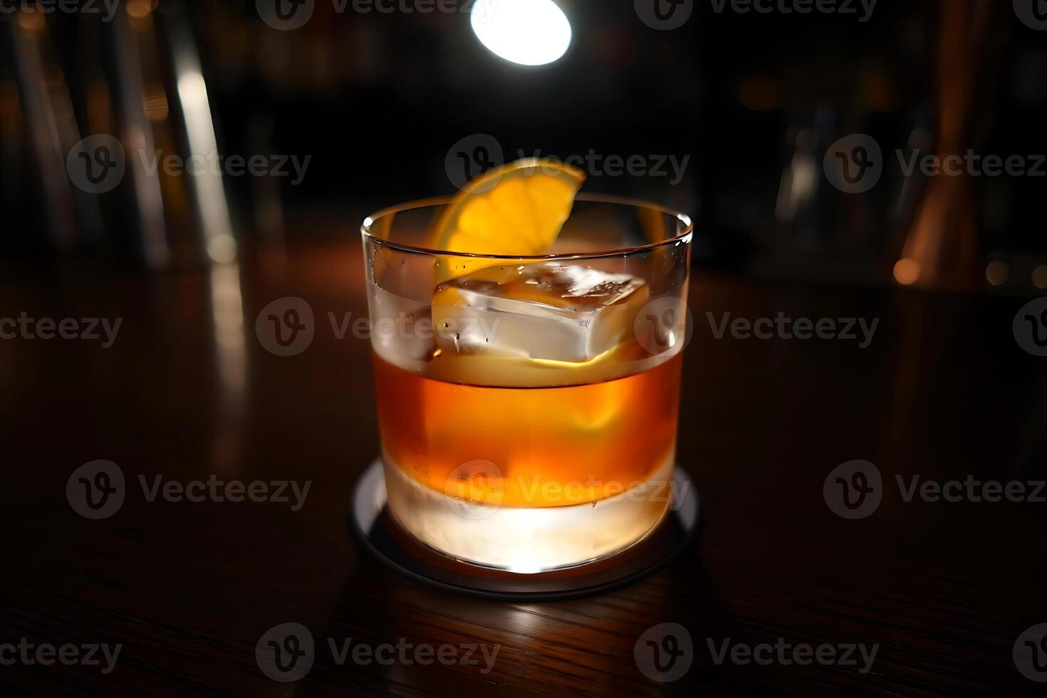 Illuminated Old Fashioned Cocktail on a Dark Bar Surface photo