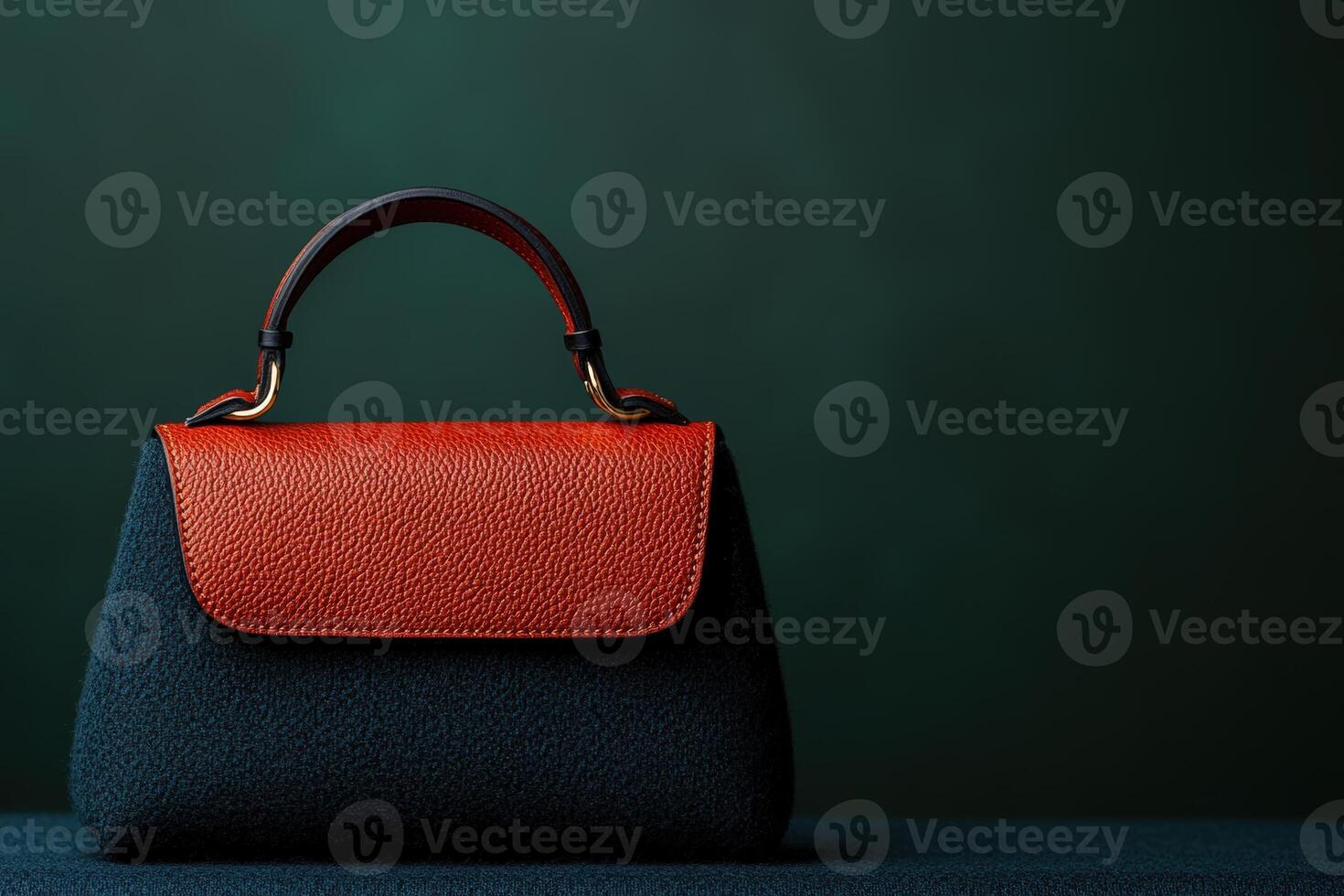 Stylish handbag with a unique design on a dark background in a minimalist setting photo