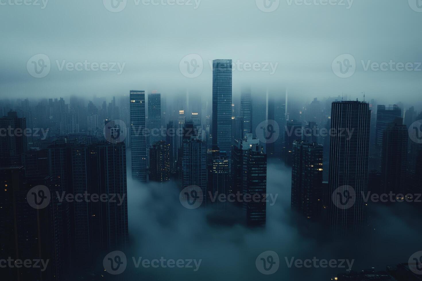 Foggy skyline view over a cityscape at night with towering buildings and illuminated lights photo