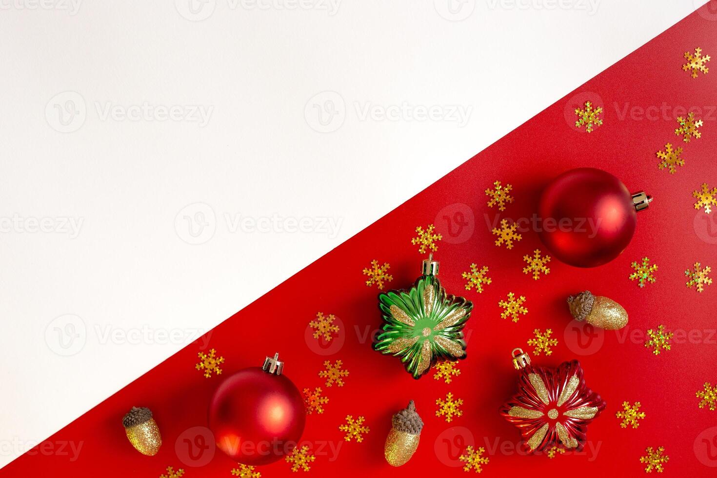 Diagonally red and white background of Christmas decorations, colored toys. photo