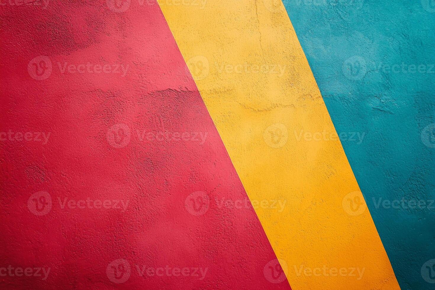 Abstract red yellow and blue painted wall with diagonal lines on a textured surface Bright art photo