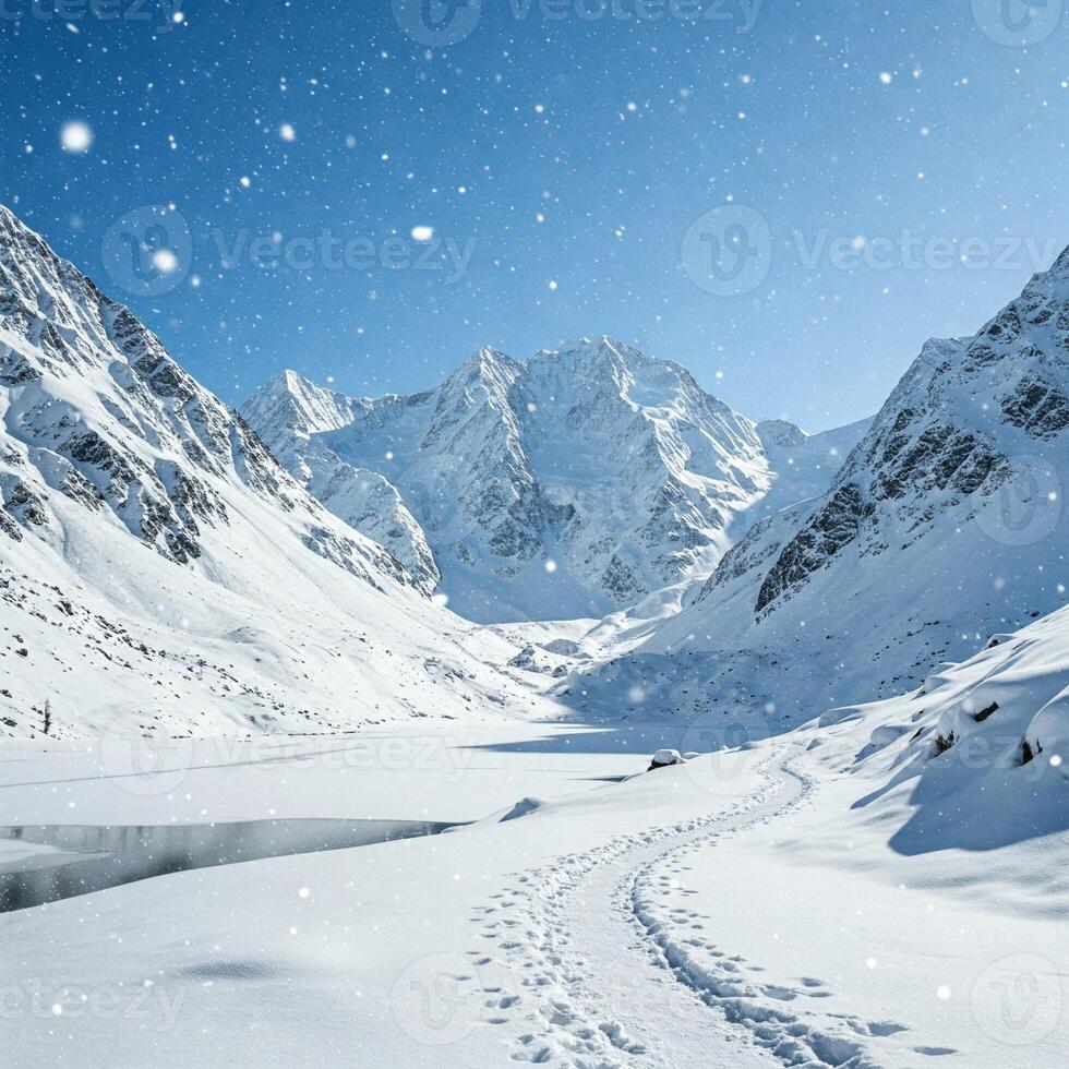 A snowy mountain landscape with a lake and snow covered mountains photo
