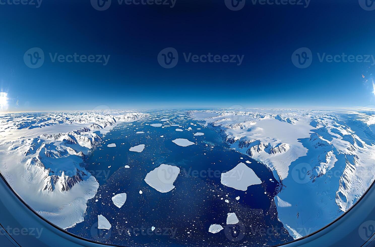 Aerial View Of Antarctic Mountains And Icebergs photo