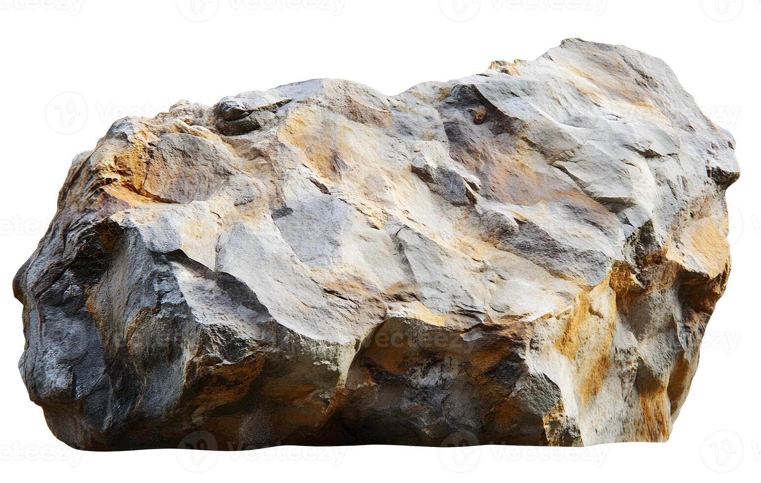 A Large Rough Grey And Brown Rock Formation photo