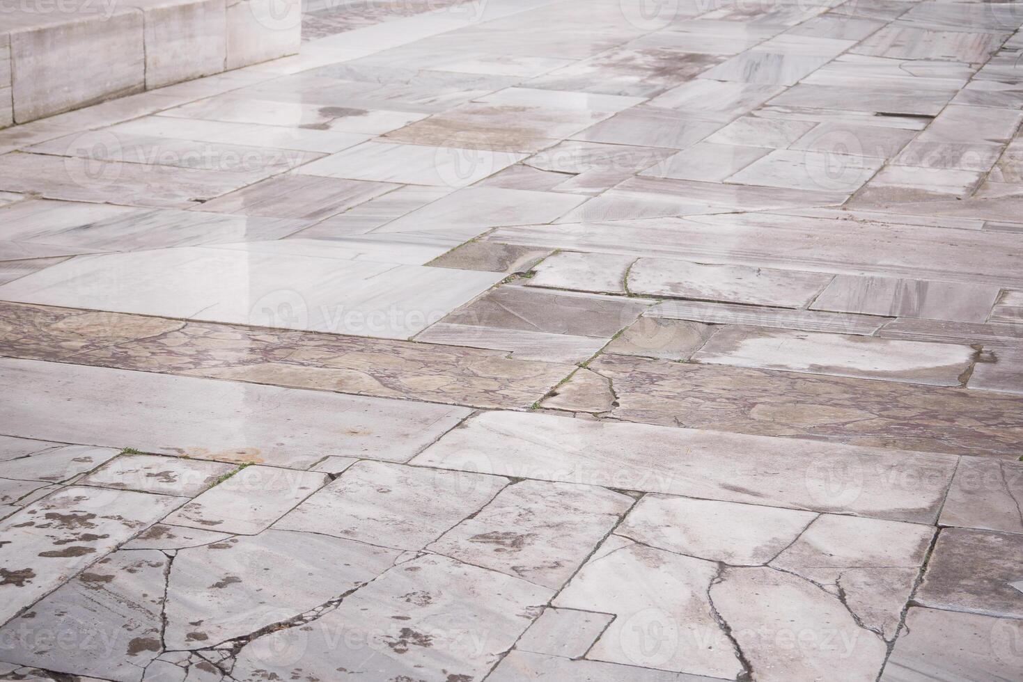 Marble pavement surface with unique stone patterns and textures photo