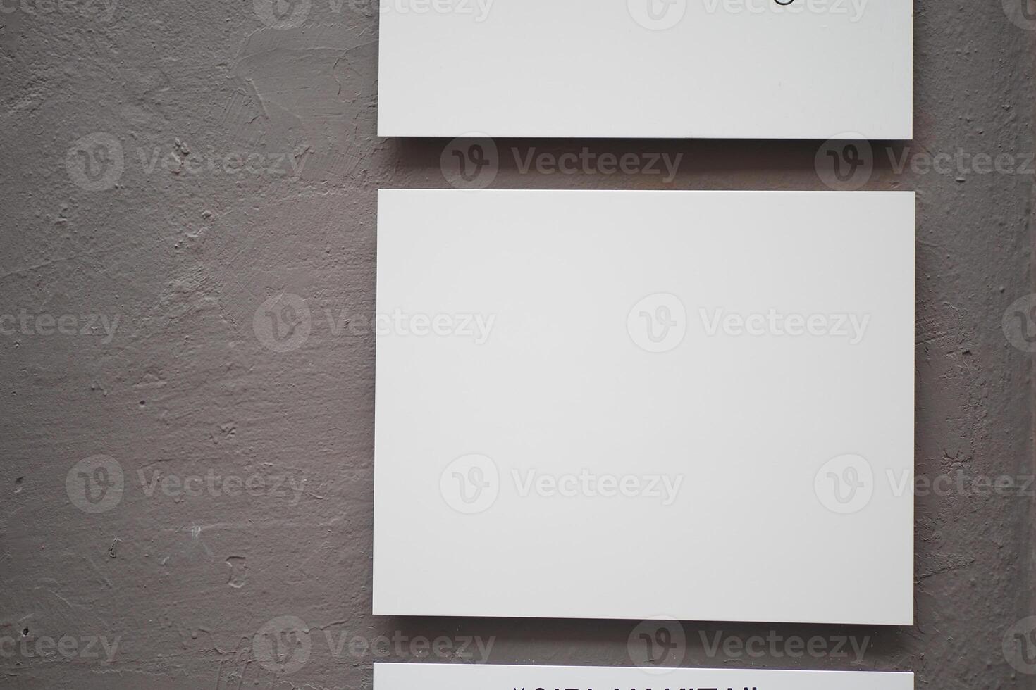 Empty display boards in an exhibition space during an art show photo
