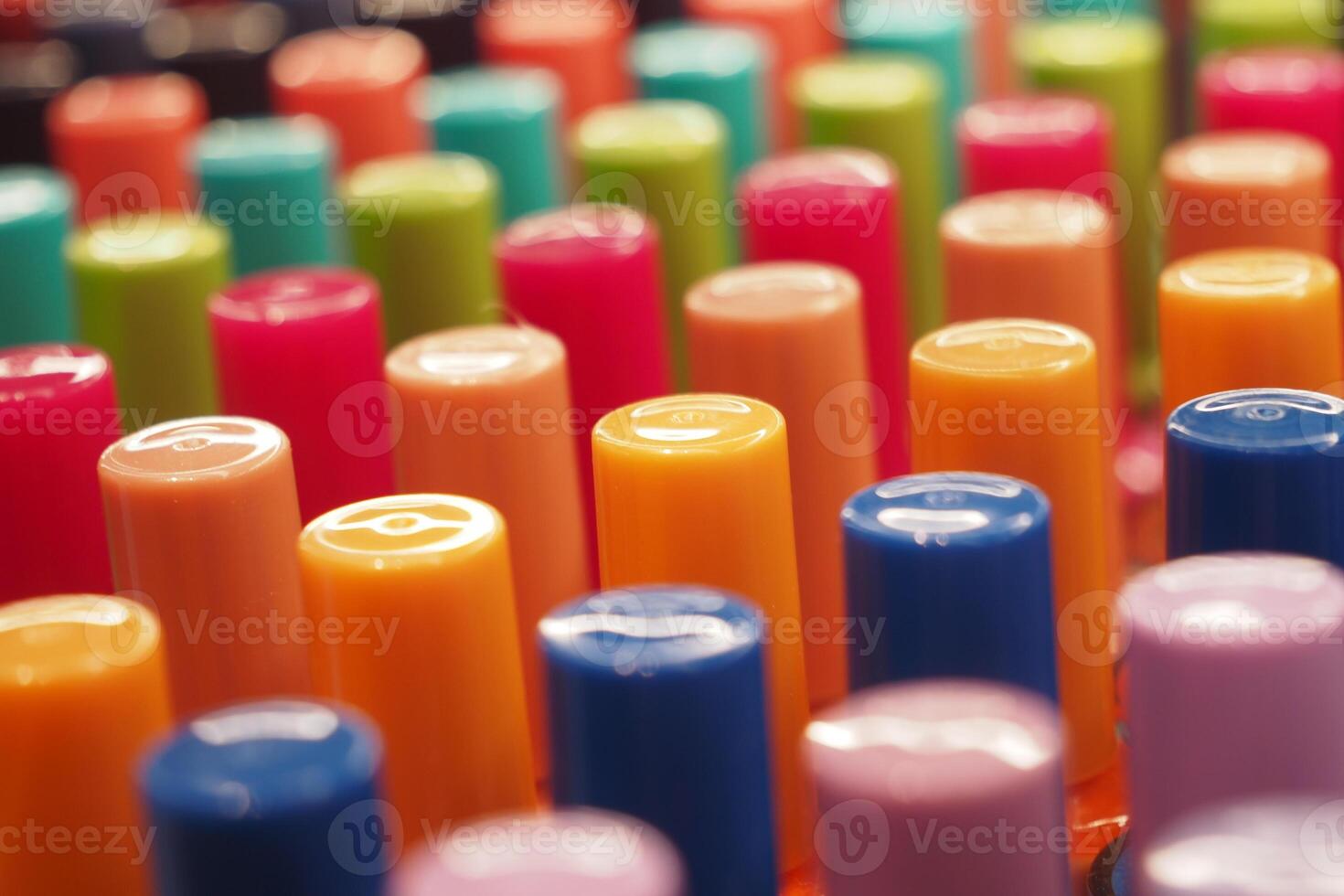 Colorful array of nail polish bottles in a beauty store display photo