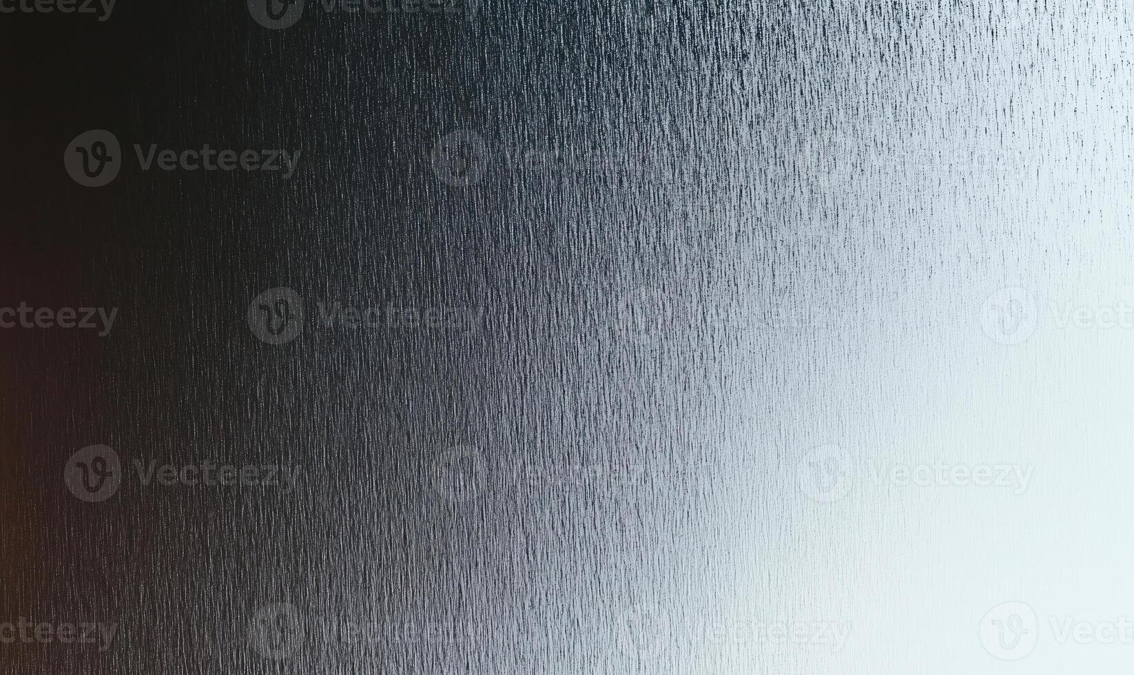 Dark Gray Frosted Texture Fading to White - Abstract Gradient Background with Grainy Surface Transition photo