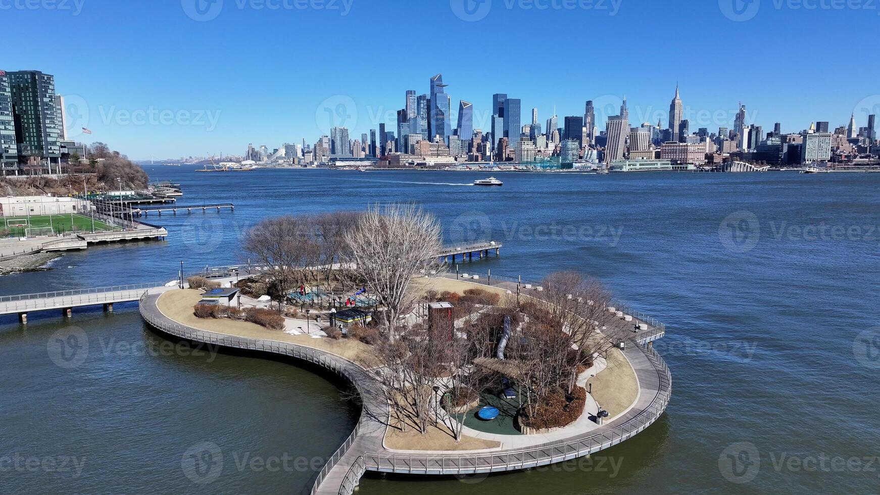 Above Hudson River Walkway in Jersey City New Jersey United States.. Skyscraper Tourism. photo