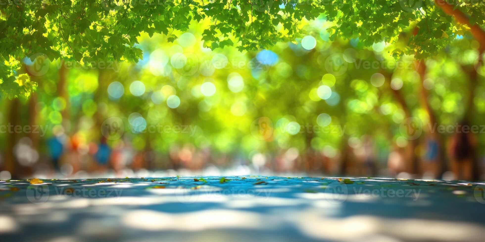 Bright sunlight filters through lush green leaves, creating a serene, colorful atmosphere in the park photo
