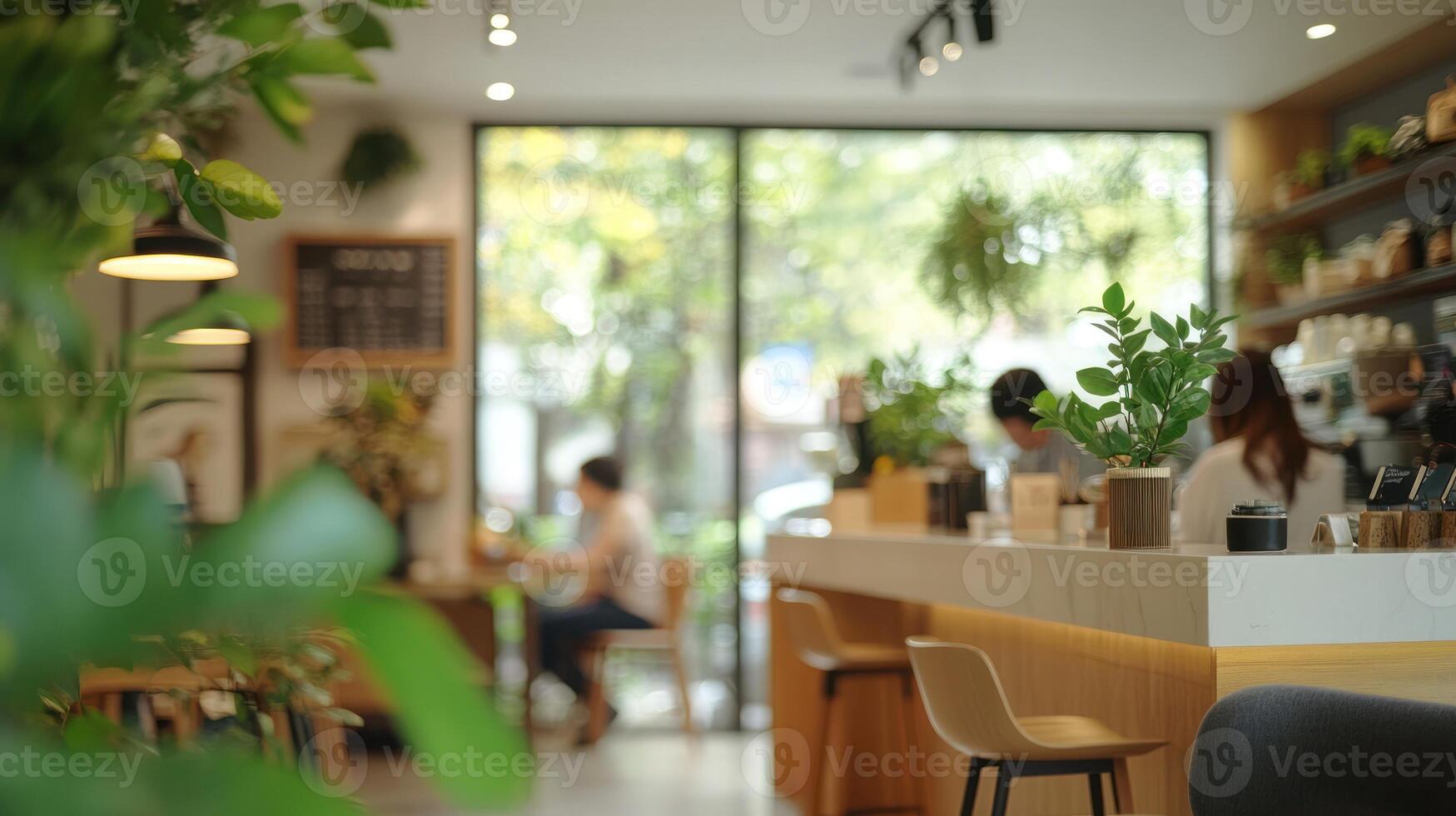 Customers relax and socialize in a bright cafe filled with greenery and warm decor on a sunny day photo