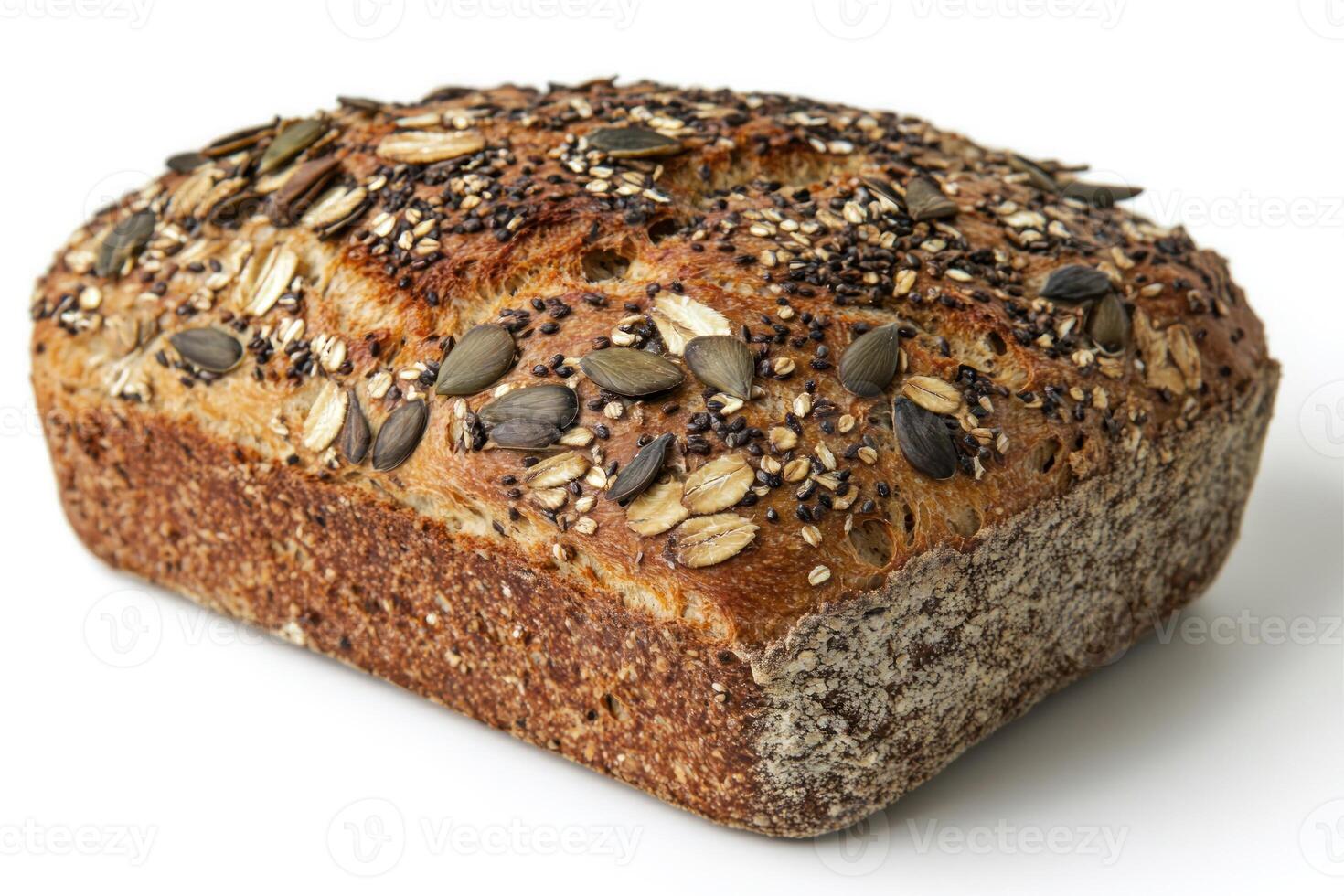Freshly baked whole grain bread topped with seeds and oats on a white background photo