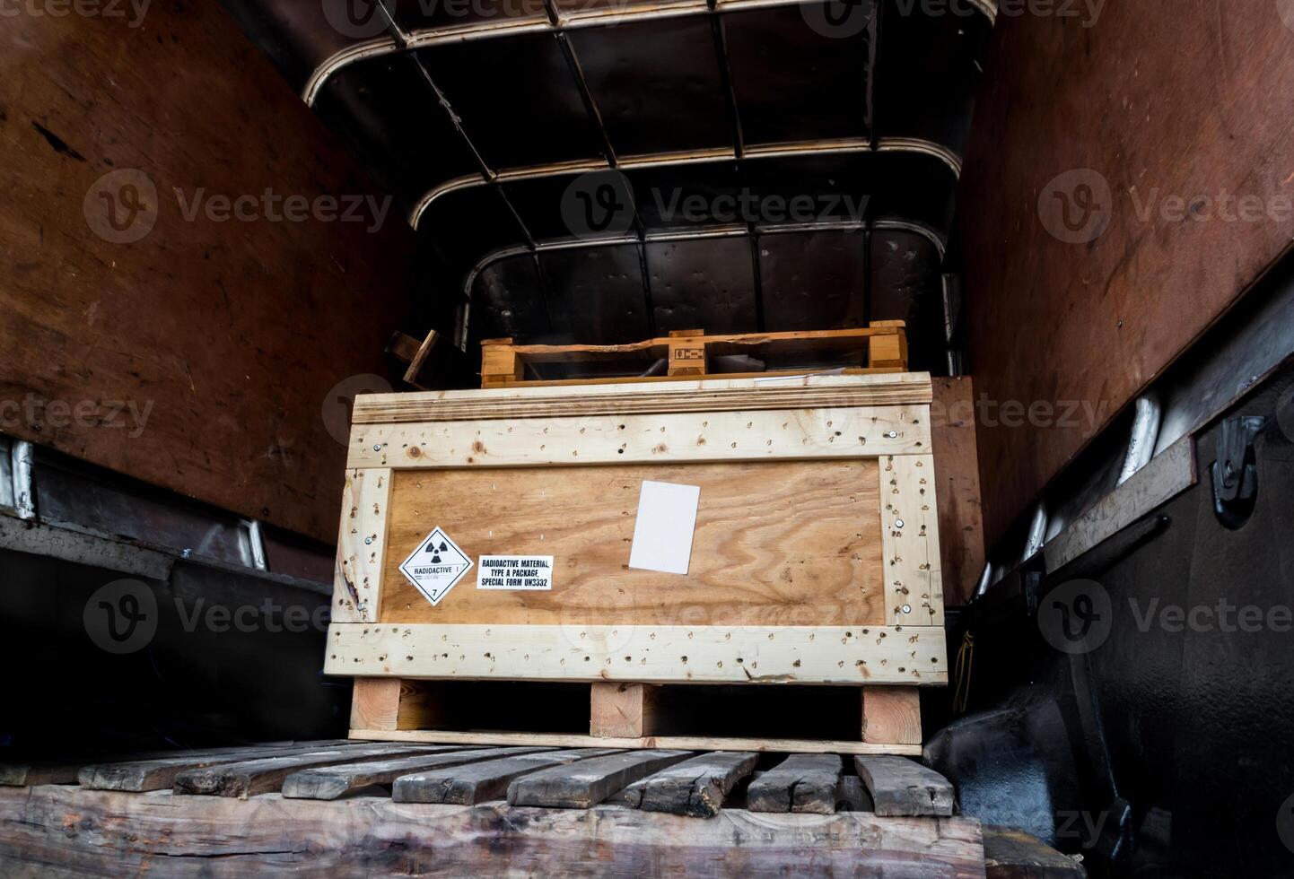 Radiation warning sign transport label Class 7 on the Dangerous goods package type A in the transport truck photo