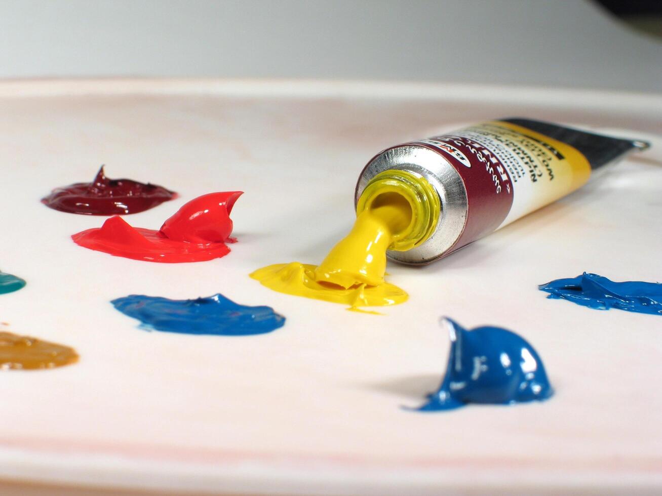 Freshly Squeezed Paint on Palette creative background photo