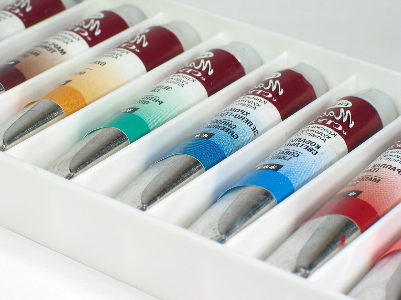 Assorted Tubes of Oil Paint creative background photo