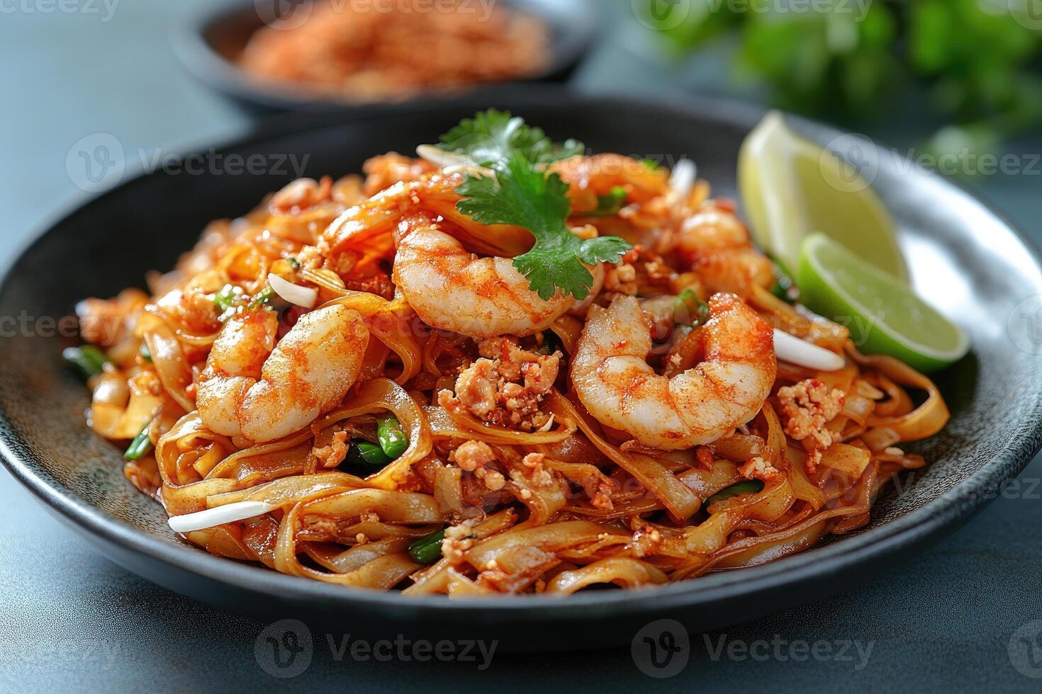Shrimp Pad See Ew with Lime and Cilantro Garnish photo