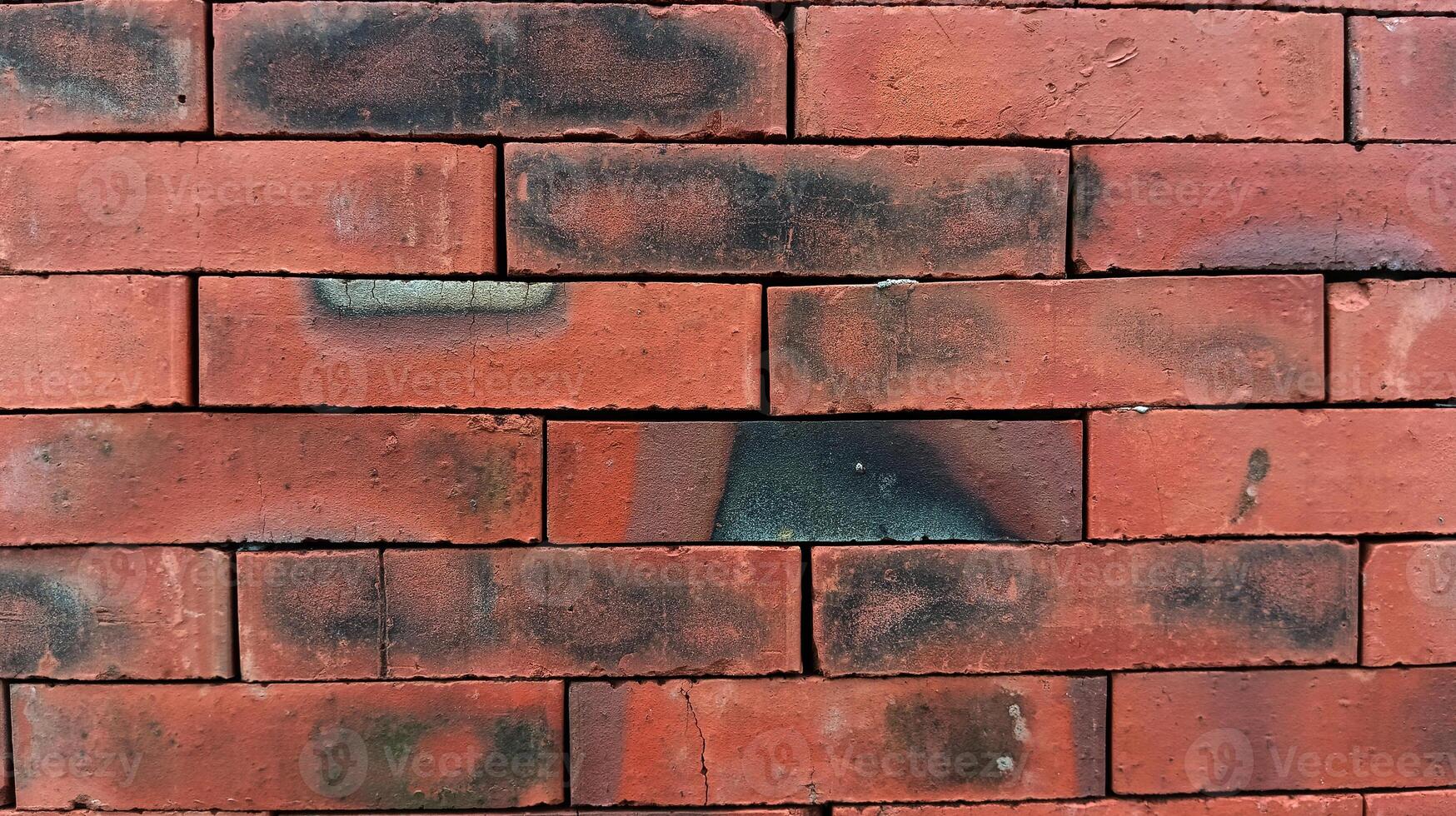 Background texture of red brick wall photo