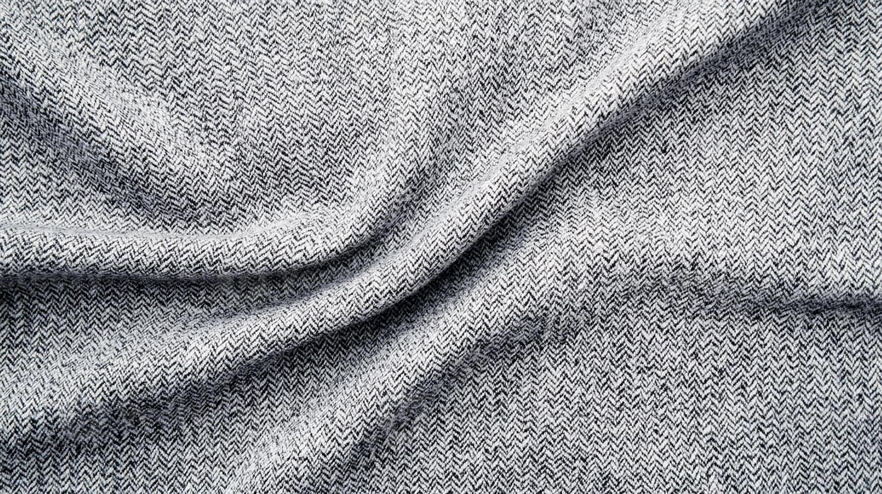 Close-Up of Herringbone Gray Fabric Texture. Woven Knit Pattern photo
