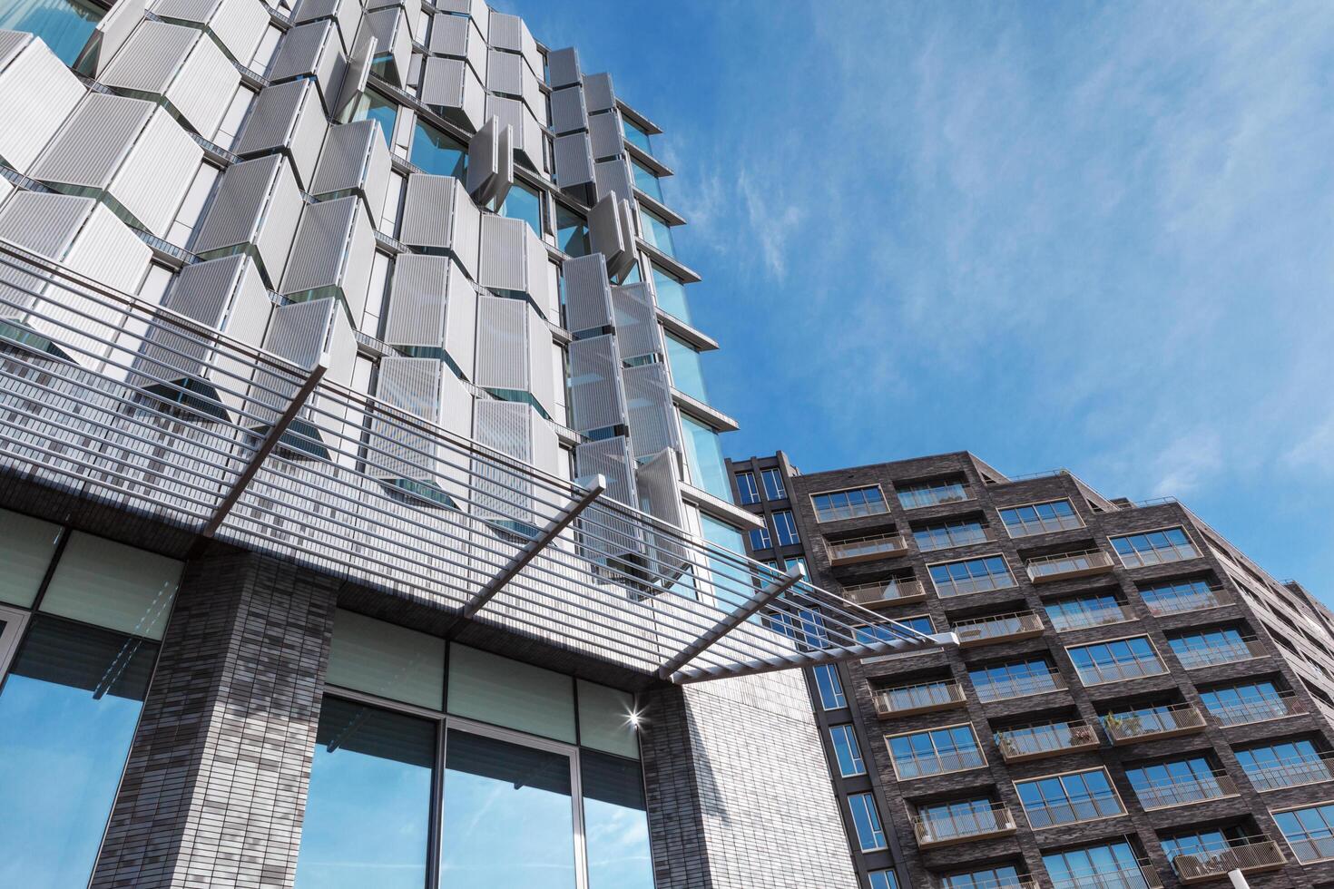 Amsterdam, the Netherlands, 2013 - Design of modern buildings faces, example of modern architecture,construction and stucco materials. photo