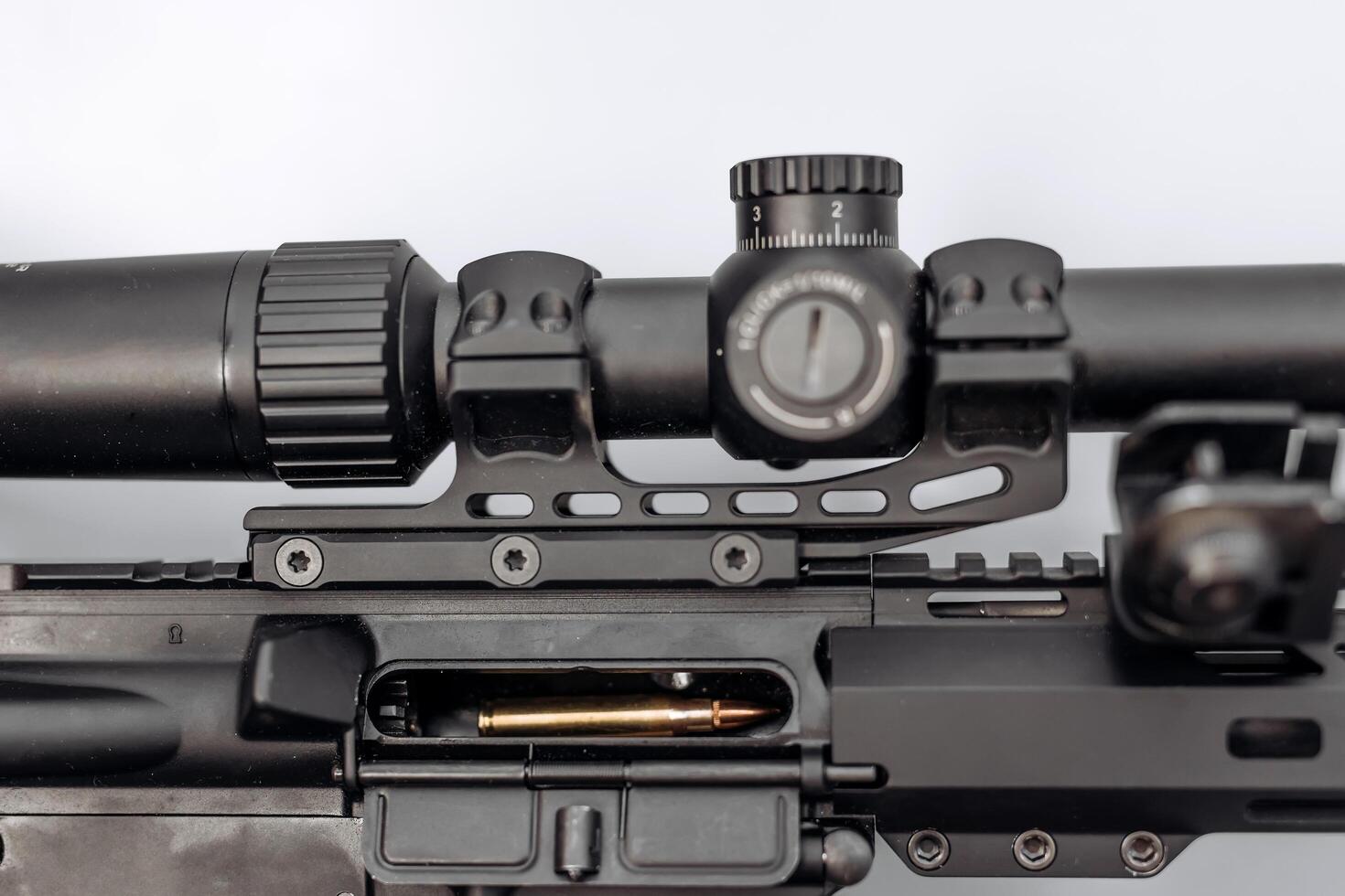 A close-up of a machine gun on a white background. The concept of selling or buying a gun. photo