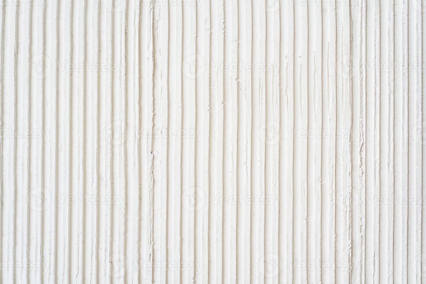 Free space for your design. A white wavy wall with space for copying. Uneven wall surface photo