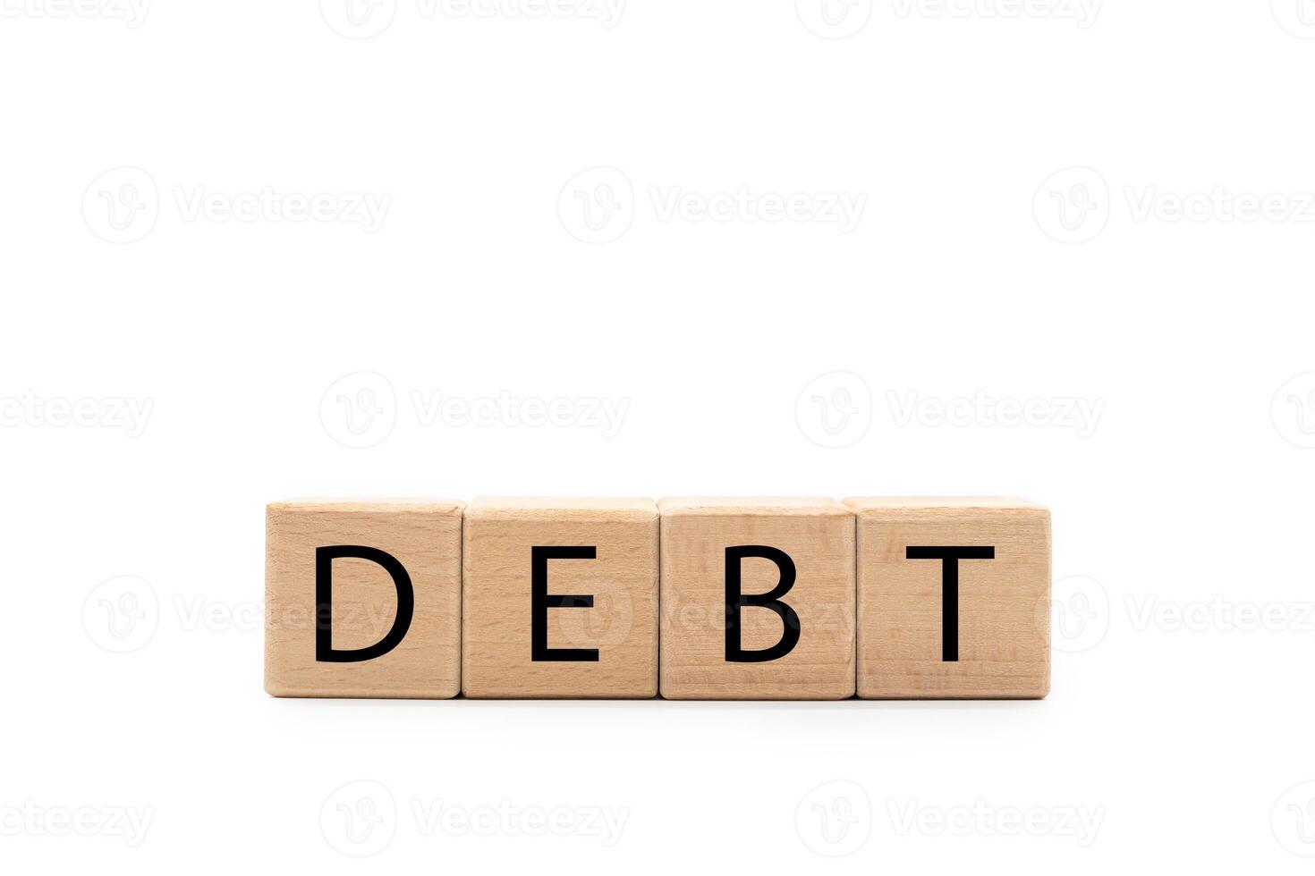 DEBT wooden text blocks isolated on white background. Copy space and clipping path. economic crisis risk and problem concept. Financial debt decrease, revenue management concept. Wooden Cubes. photo