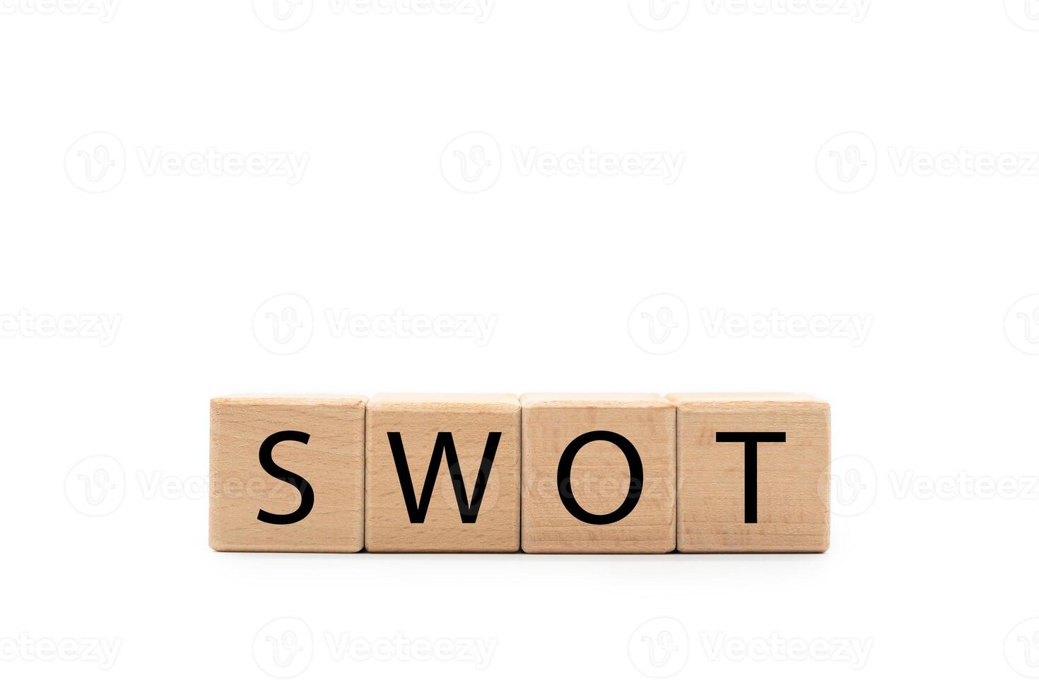 Wooden blocks with SWOT text isolated on white background. wooden cubes SWOT with copy space and clipping path. SWOT analysis for Business concept. photo