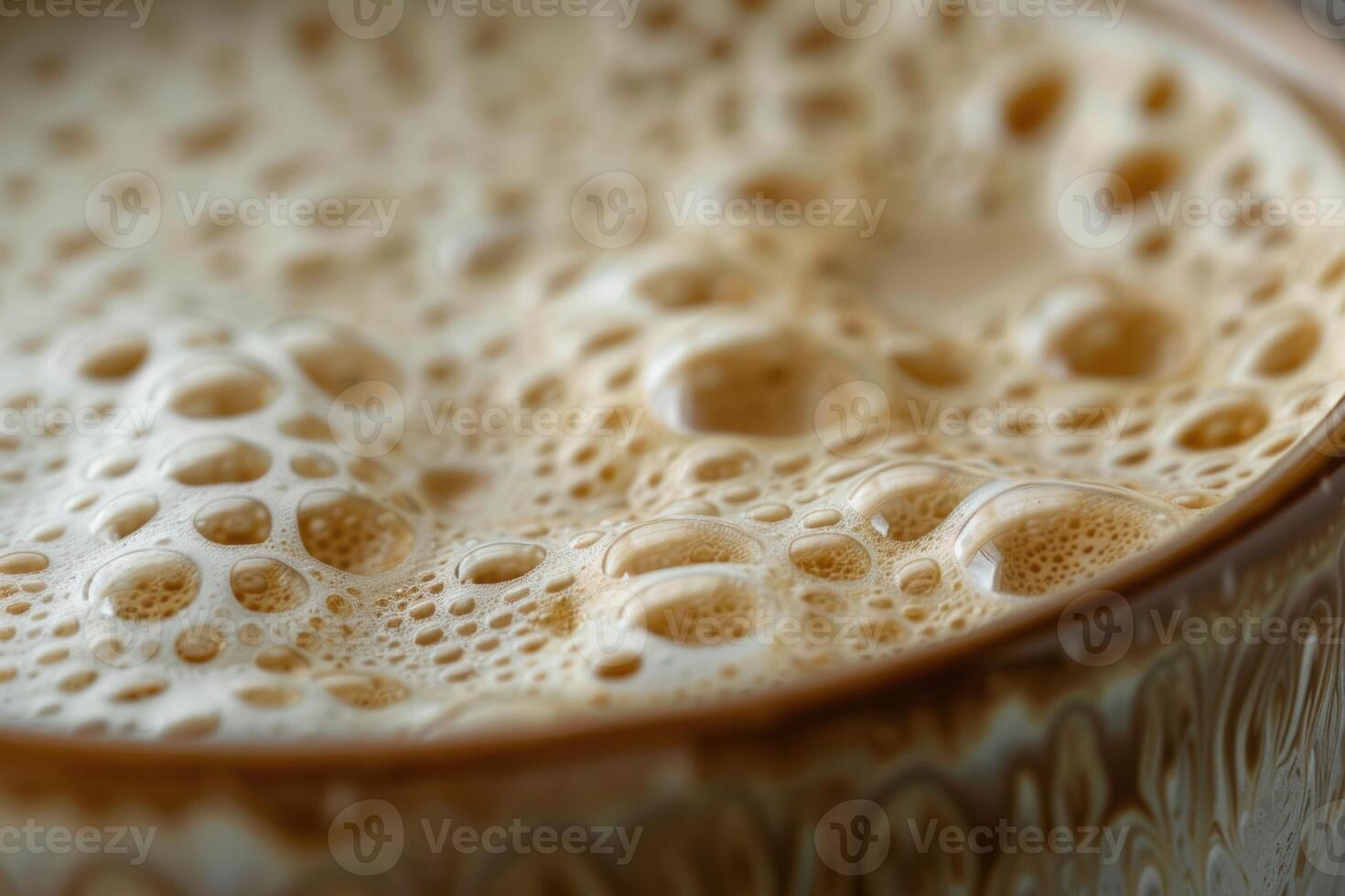 Intricate Latte Art on Freshly Brewed Cappuccino in Ceramic Cup for Cafe Menus and Coffee Invitations photo