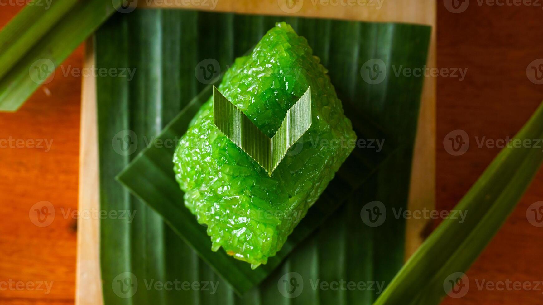 Wajik, traditional Indonesian snack made from glutinous rice on banana leaves isolated on white background studio photo