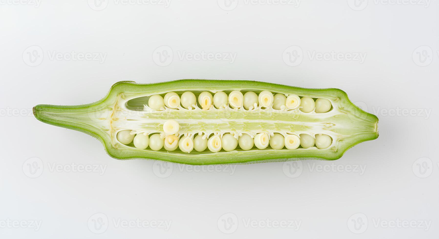 Organic okra pods placed on white background for healthy eating and plant-based meals photo