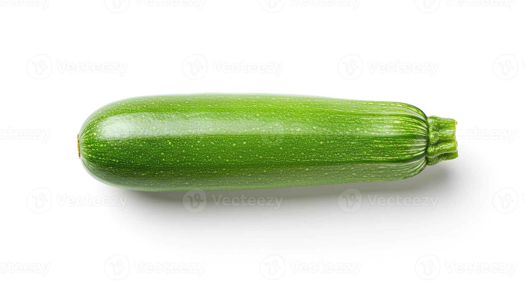 Green zucchini with skin on white background for organic food, clean eating, and seasonal vegetables photo