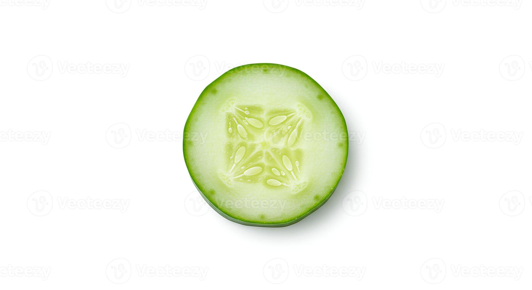 Top view of cucumber slice placed on white background for vegan and vegetarian meal visuals photo
