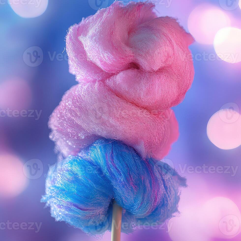 Cotton candy on a stick with blue and pink colors photo