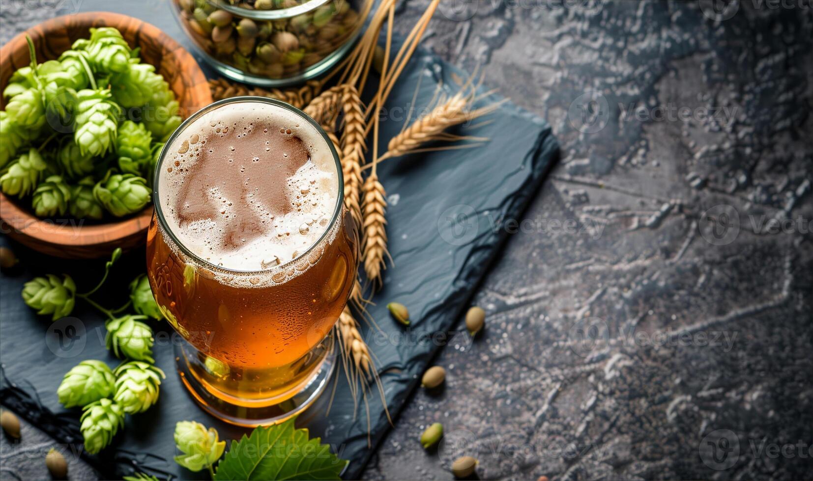 Beer glass and fresh Hops and Barley photo