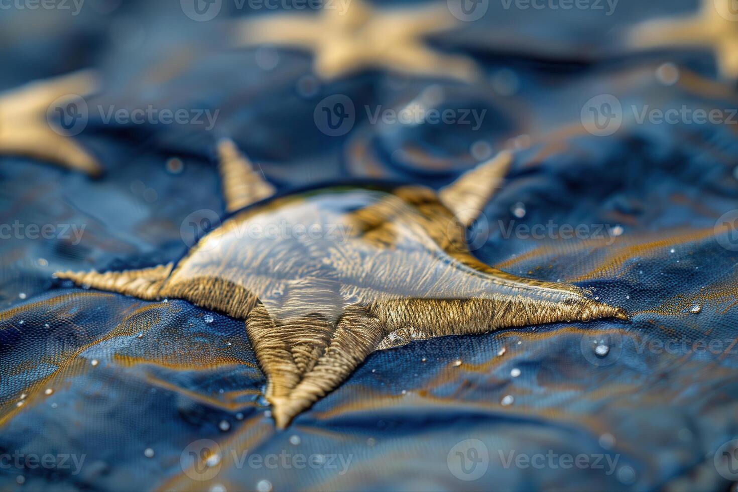Ultra Detailed Shot of Droplet on Veterans Folded Flag Highlighting Star Reflection photo