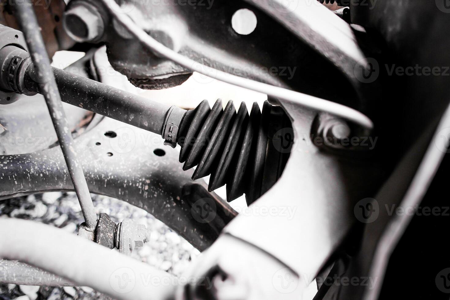 Drive shaft boot, Close up a rubber boot of front drive shaft photo