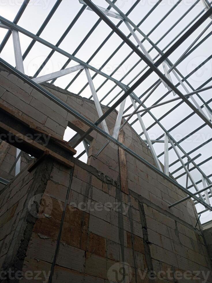 Interior View of Roof Truss Installation on an Unfinished House photo