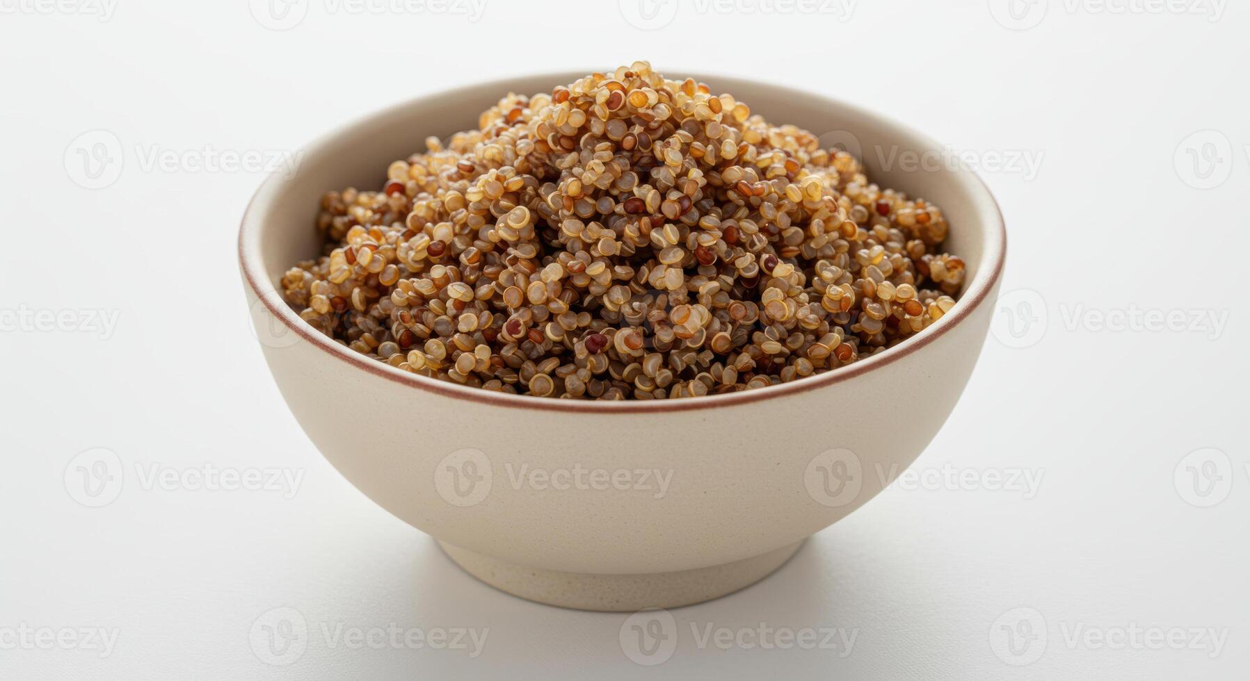 A beautifully presented bowl of fluffy, cooked quinoa, ready to be enjoyed as a nutritious meal. photo