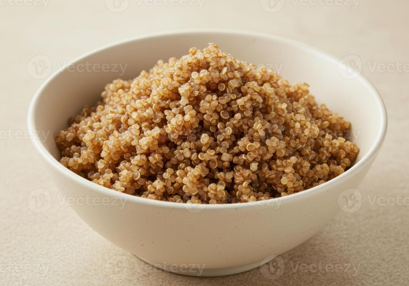 A bowl of fluffy, cooked quinoa, a versatile and healthy grain, ready to be served. photo