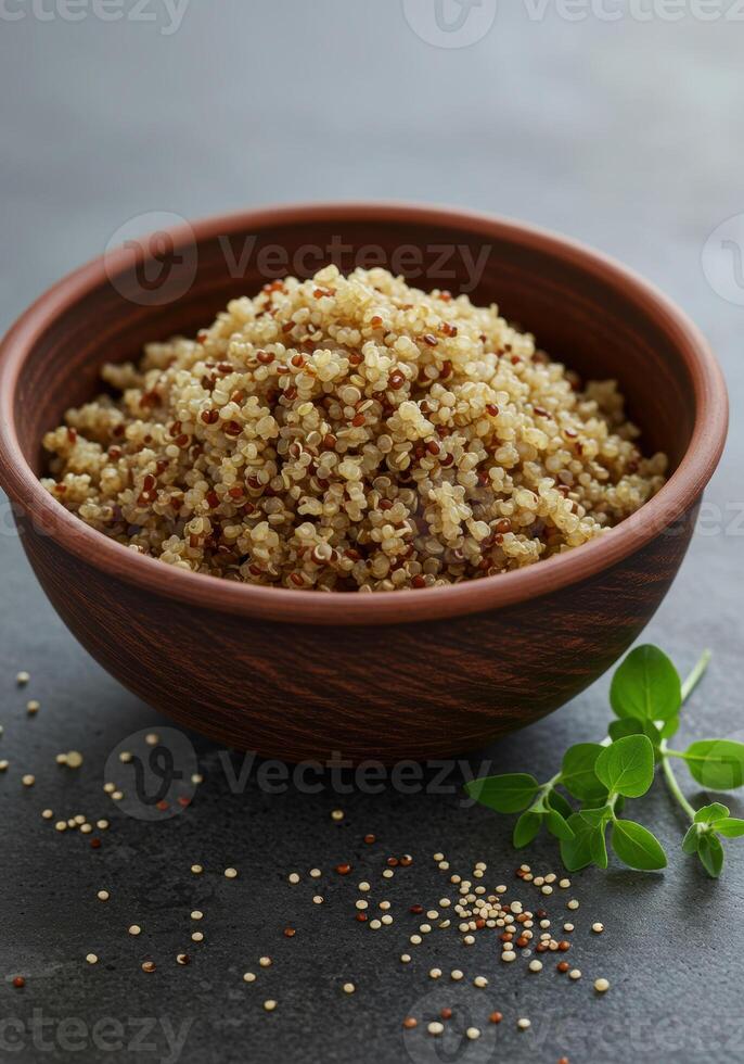 A full bowl of fluffy, cooked quinoa ready to be enjoyed as a nutritious meal. photo