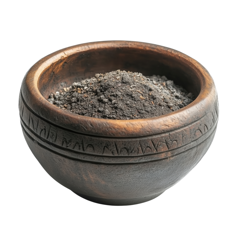 Natural Black Powder in Wooden Bowl for Culinary and Craft Uses png