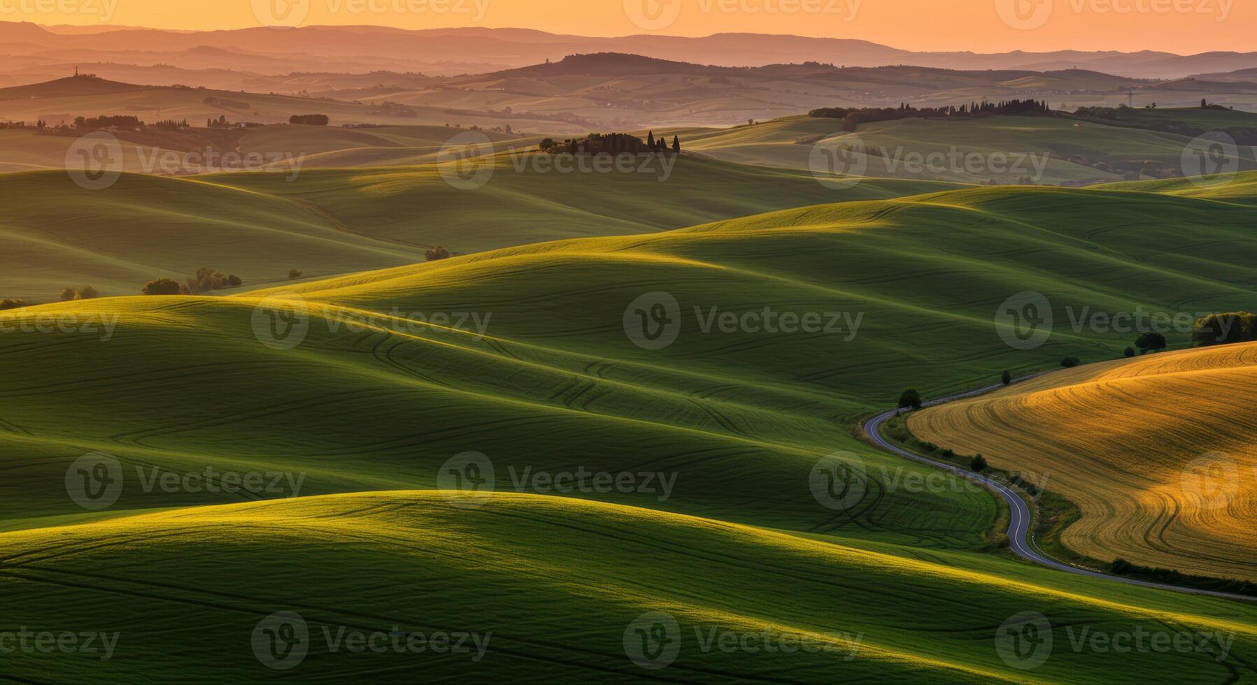 A breathtaking view of the rolling hills bathed in the warm light of the sunset. photo