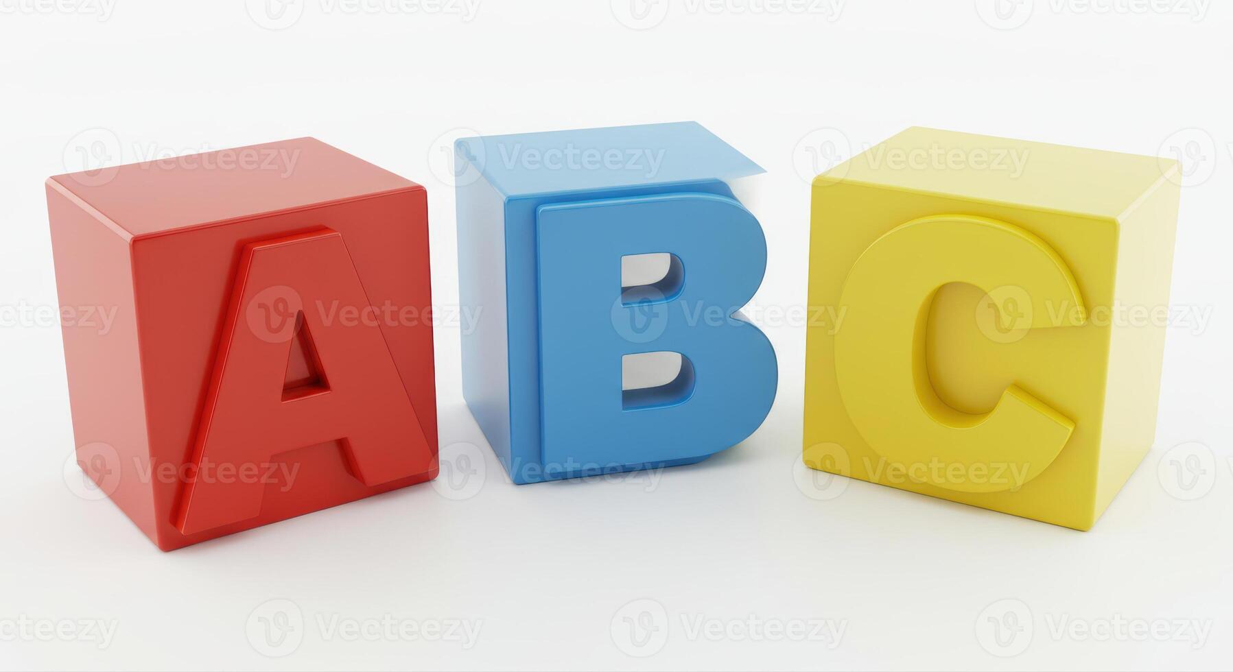 Three brightly colored blocks spell out the letters A, B, and C on a white surface. photo