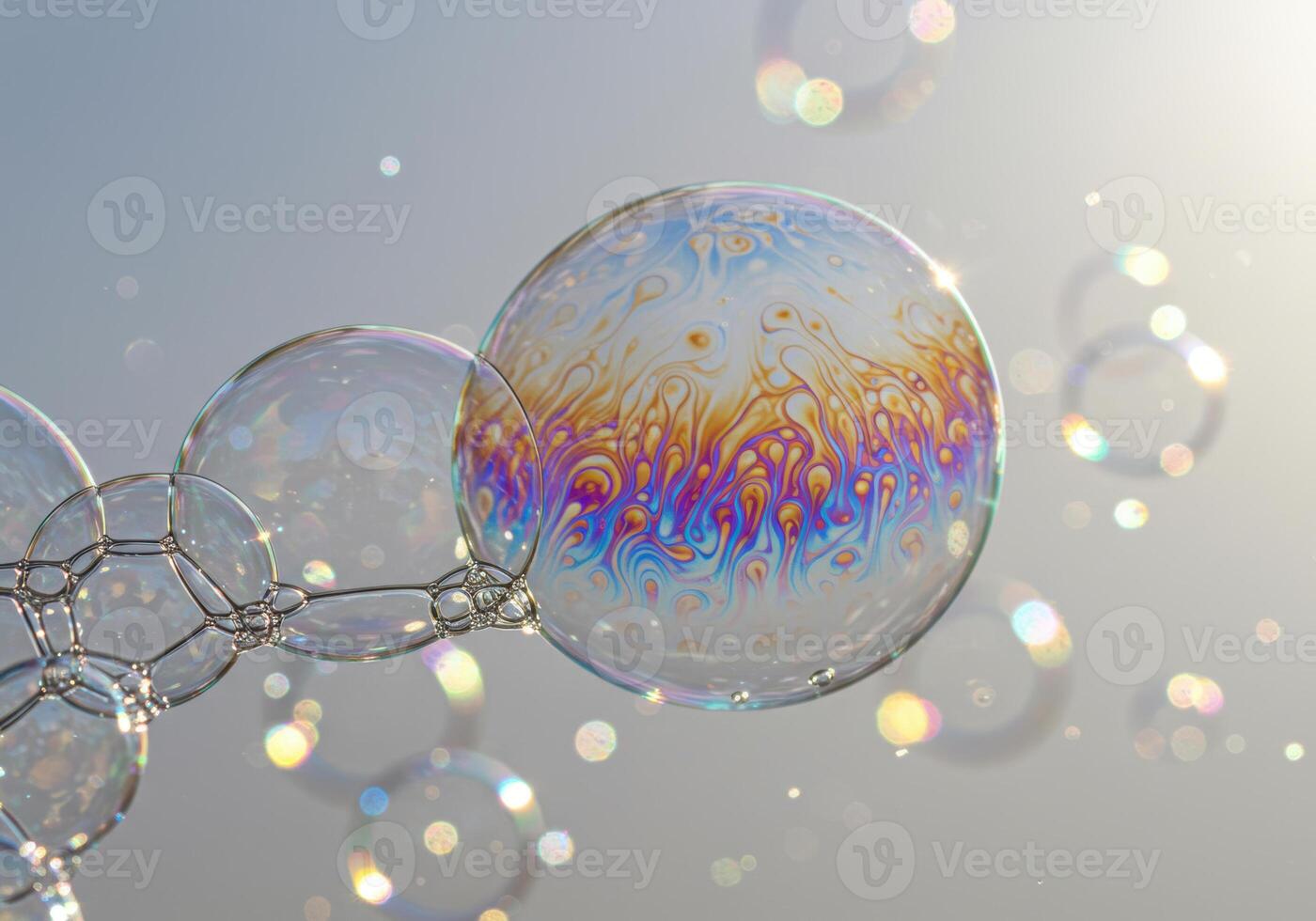 Captivating shot of soap bubbles, showcasing their shimmering, iridescent surfaces. photo