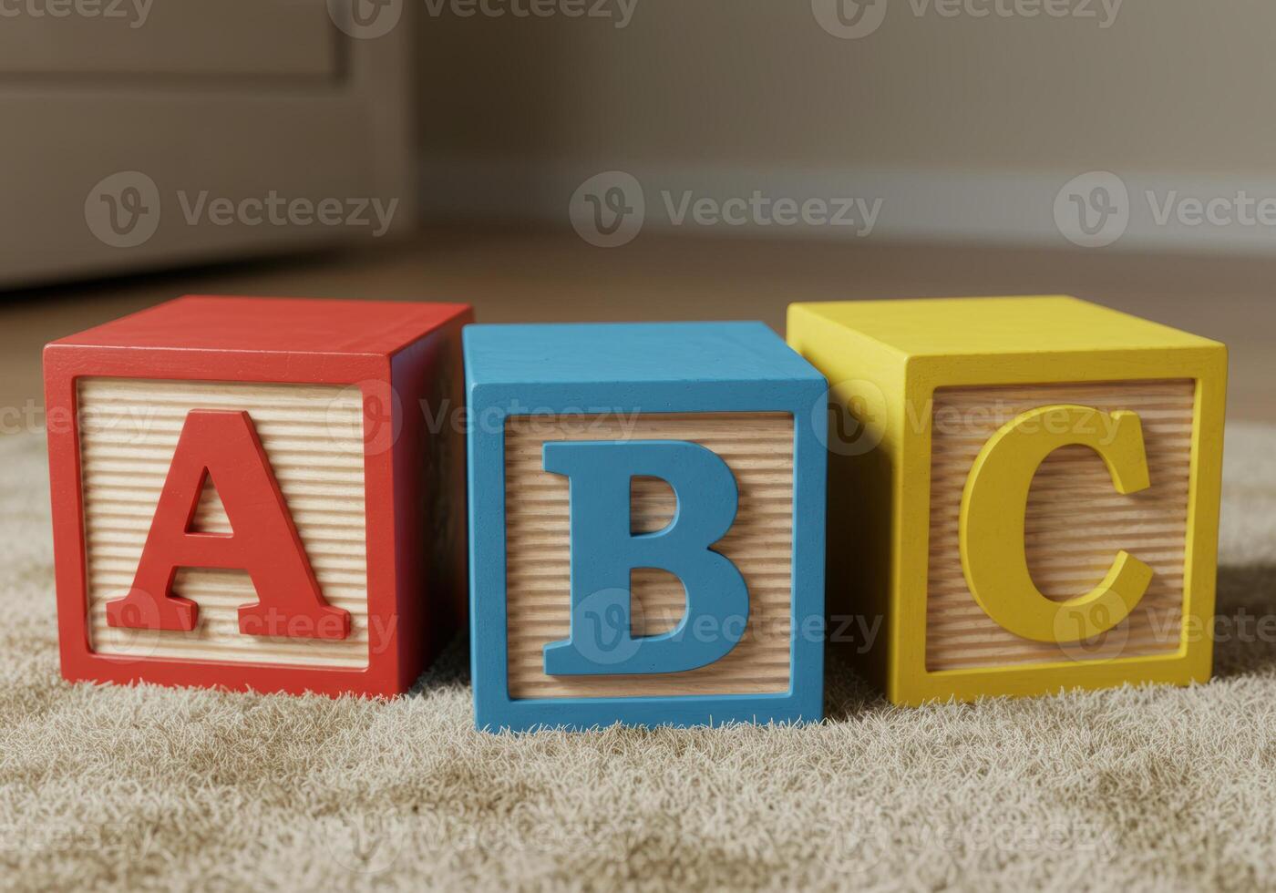 Vibrant wooden blocks with the letters a, b, and c displayed on a fluffy carpet. photo